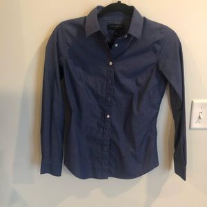 Woman’s tailored button down shirt